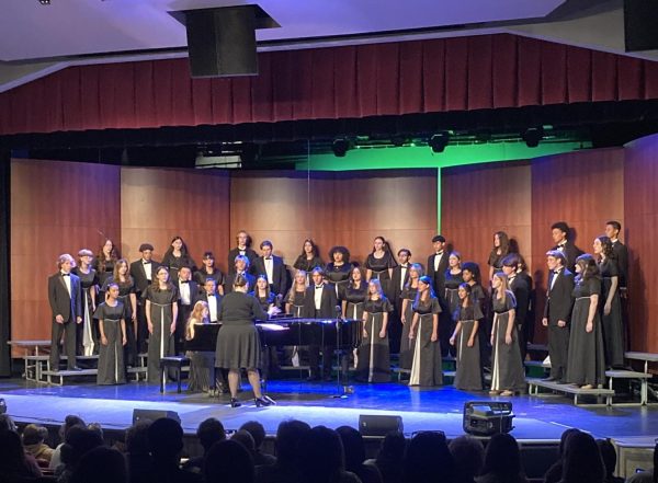 SINGING WITH A PASSION: The WHS Vocal Ensemble passionately sings “Exsultate in Domino,” the first song of their set.