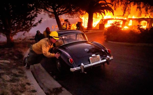 Devastation in Camarillo: Ventura County fire fighters rush people to safety, for the flames begin to reach hills and homes. The fire picked up in Somis and made its way to Camarillo Heights leading to the fire consuming a majority of Camarillo. PHOTO COURTESY OF CC 4.0